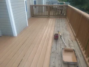 an exterior deck being stained